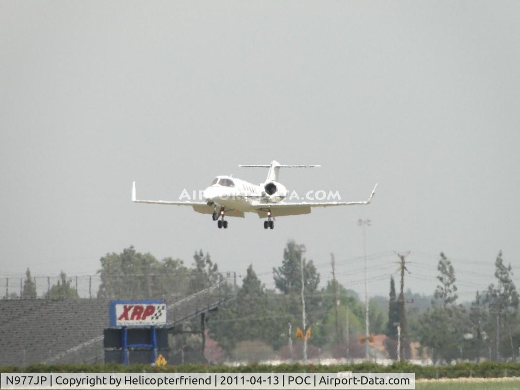N977JP, 1997 Learjet 31A C/N 140, On final to runway 26L