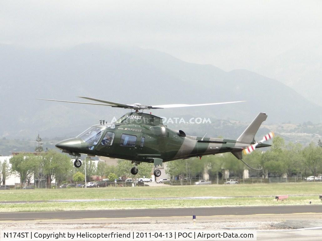 N174ST, 2001 Agusta A-109E Power C/N 11115, Air taxiing to helipads by Ranger Row