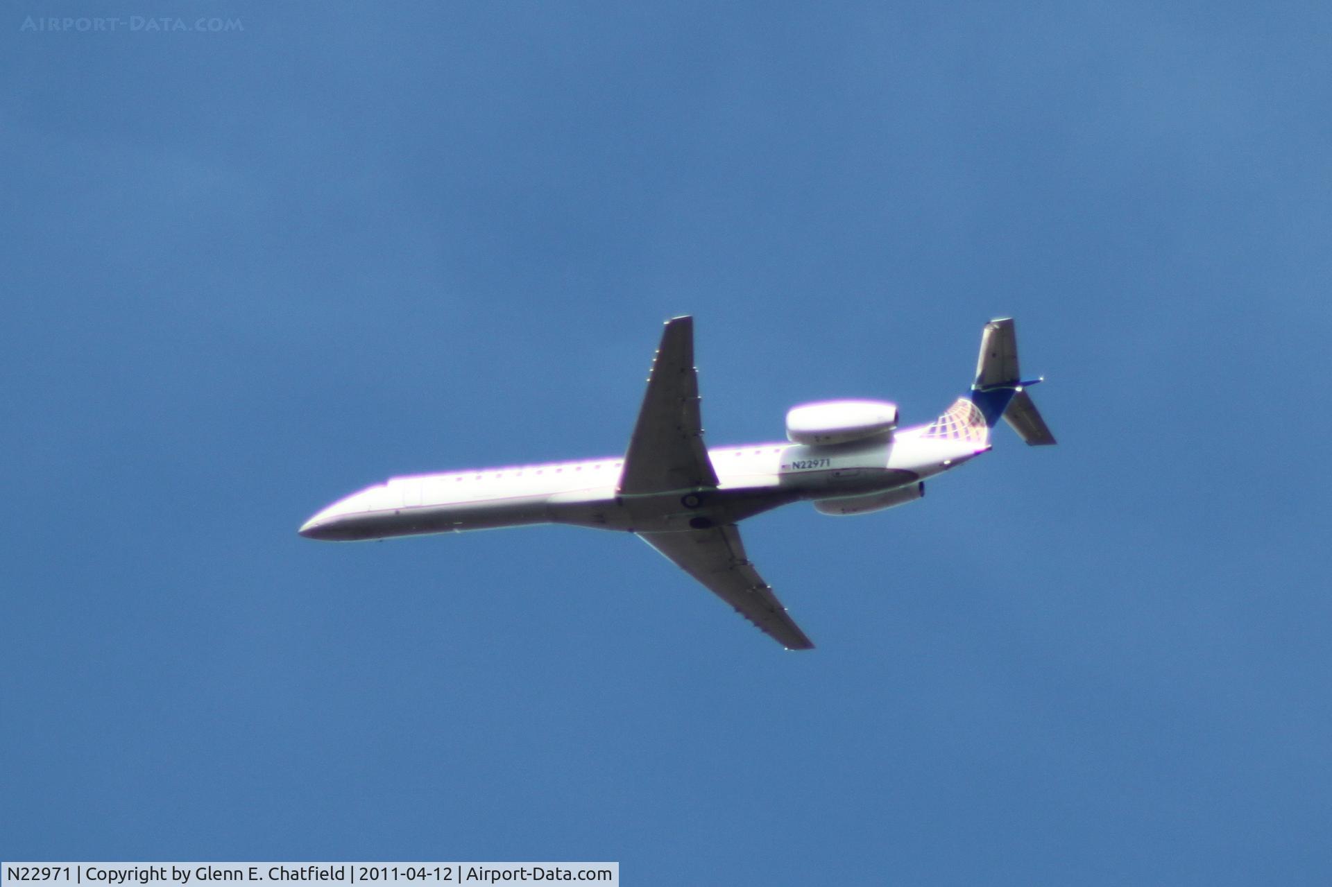 N22971, 1999 Embraer Embraer EMB-145LR C/N 145149, Flying over Morton Arboretum, Lisle, IL on approach to land O'Hare