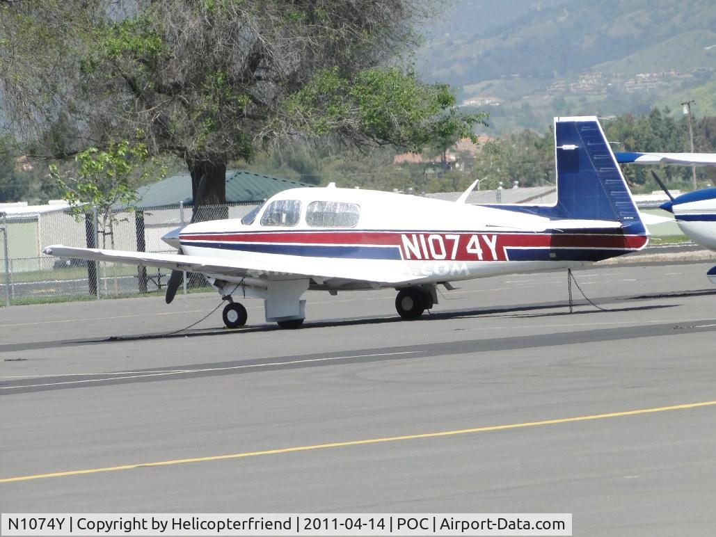 N1074Y, 1990 Mooney M20J 201 C/N 24-3149, Parked and tied down in transient parking
