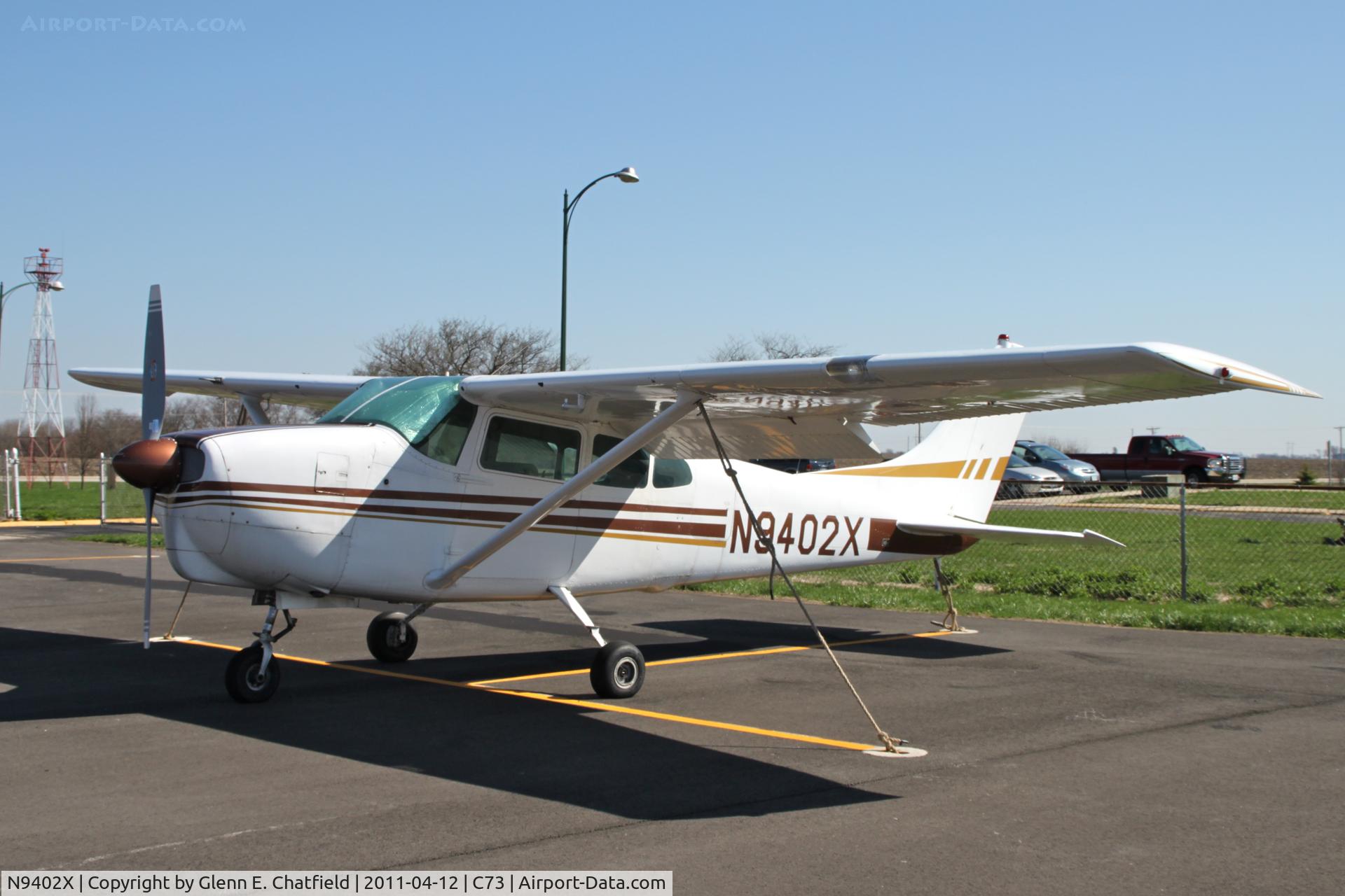 N9402X, 1961 Cessna 210A C/N 21057702, Parked in the morning sun