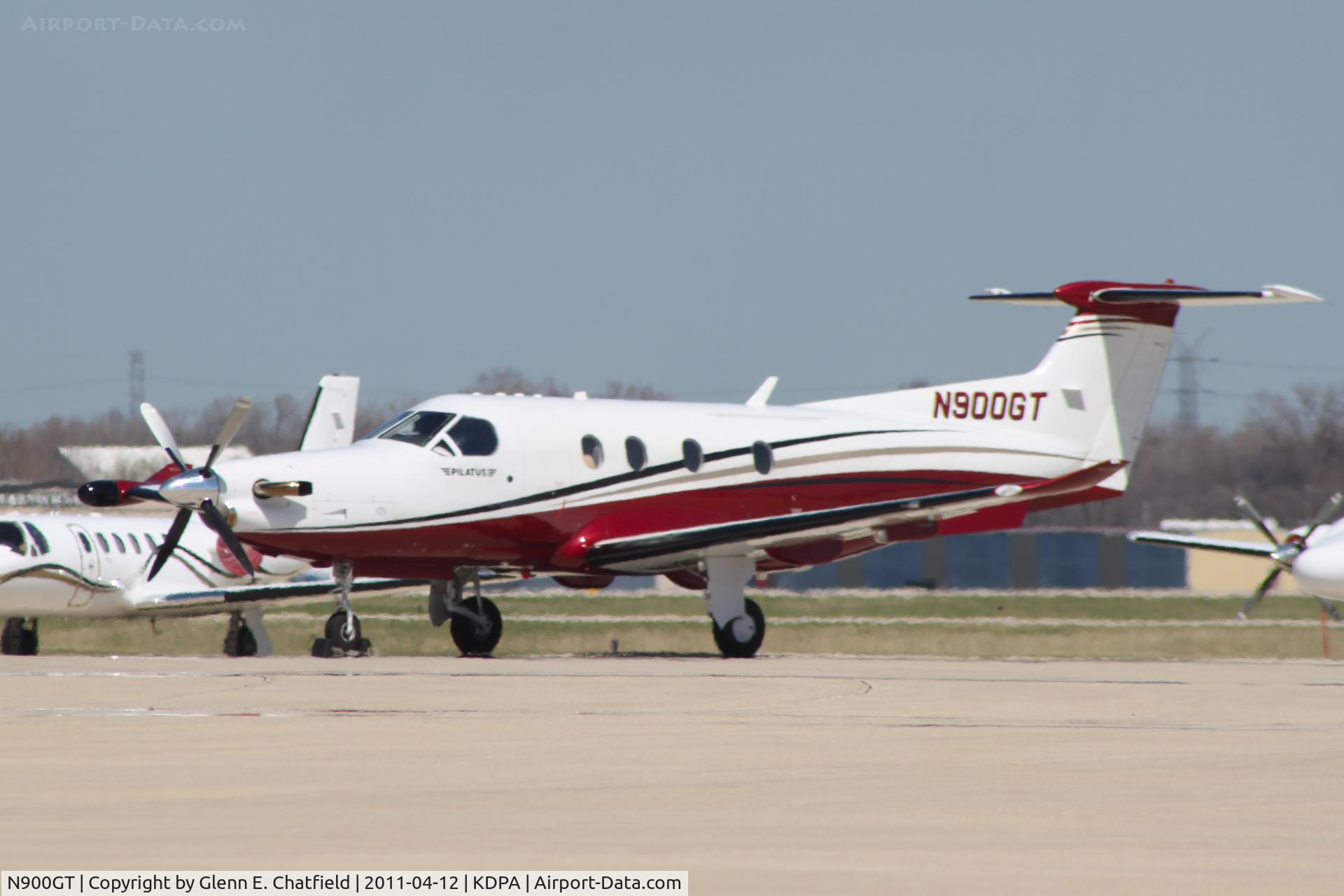 N900GT, 2009 Pilatus PC-12/47E C/N 1158, Photographed through a chain-link fence.