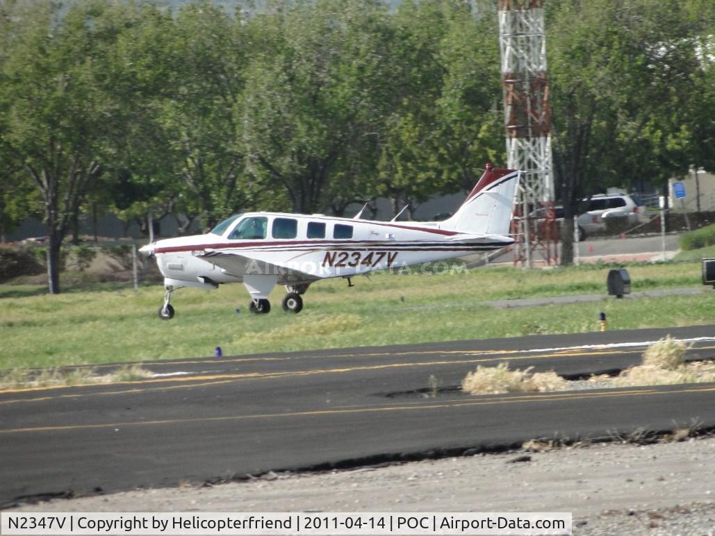 N2347V, 1998 Raytheon Aircraft Company A36 Bonanza C/N E-3147, Rolling westbound for take off from runway 26L