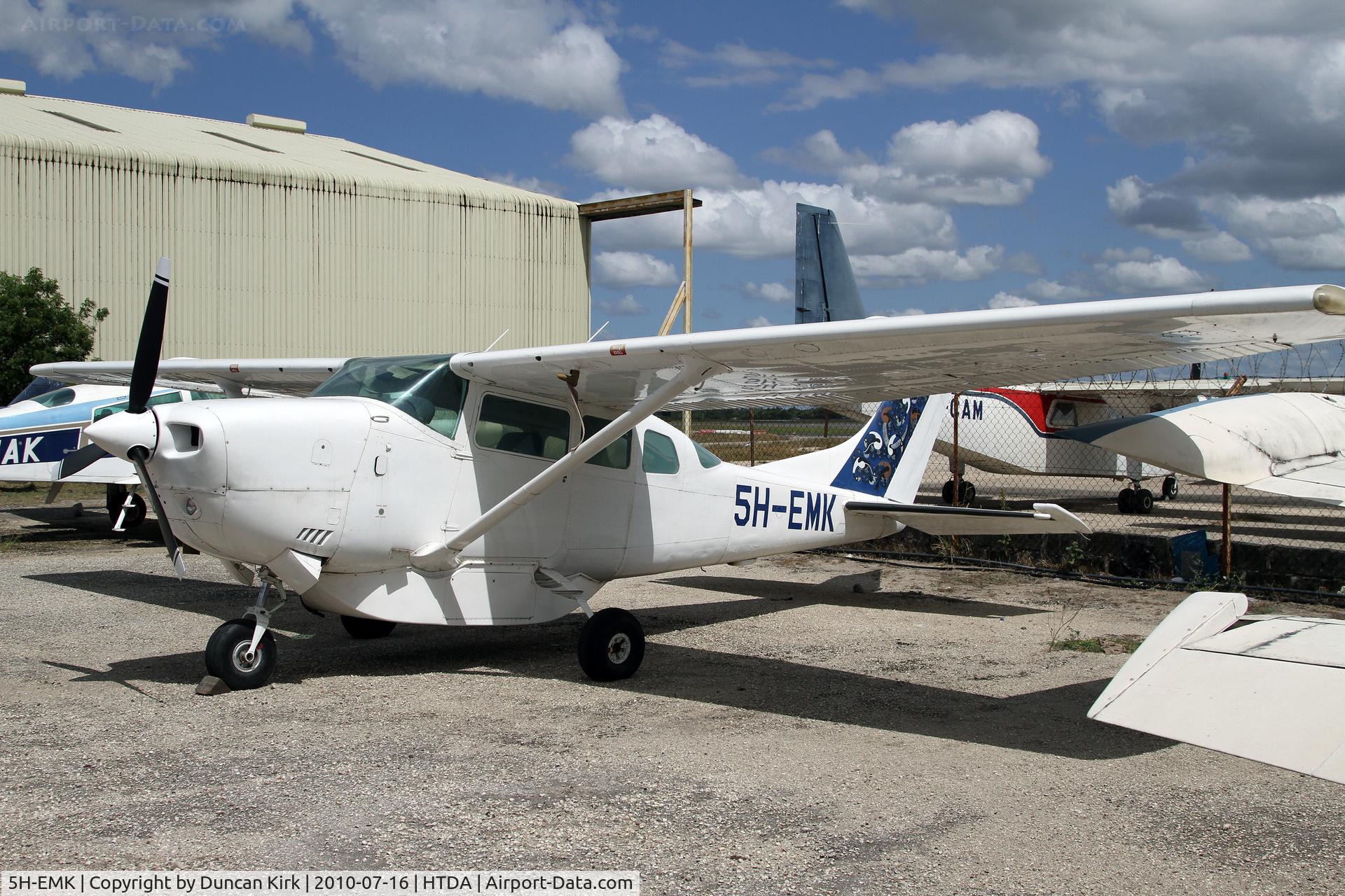 5H-EMK, Cessna TU206G Turbo Stationair Turbo Stationair C/N U206-04638, Crammed in on the crowded GA ramp