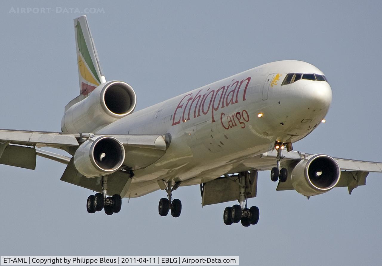 ET-AML, 1997 McDonnell Douglas MD-11F C/N 48758, I am a pure Trijet Lover and this photo is just another justification. And you haven't felt anything yet if you're not been in the plane by steep take off, I tell you. Short final rwy 23L. A bit early for ideal light conditions.