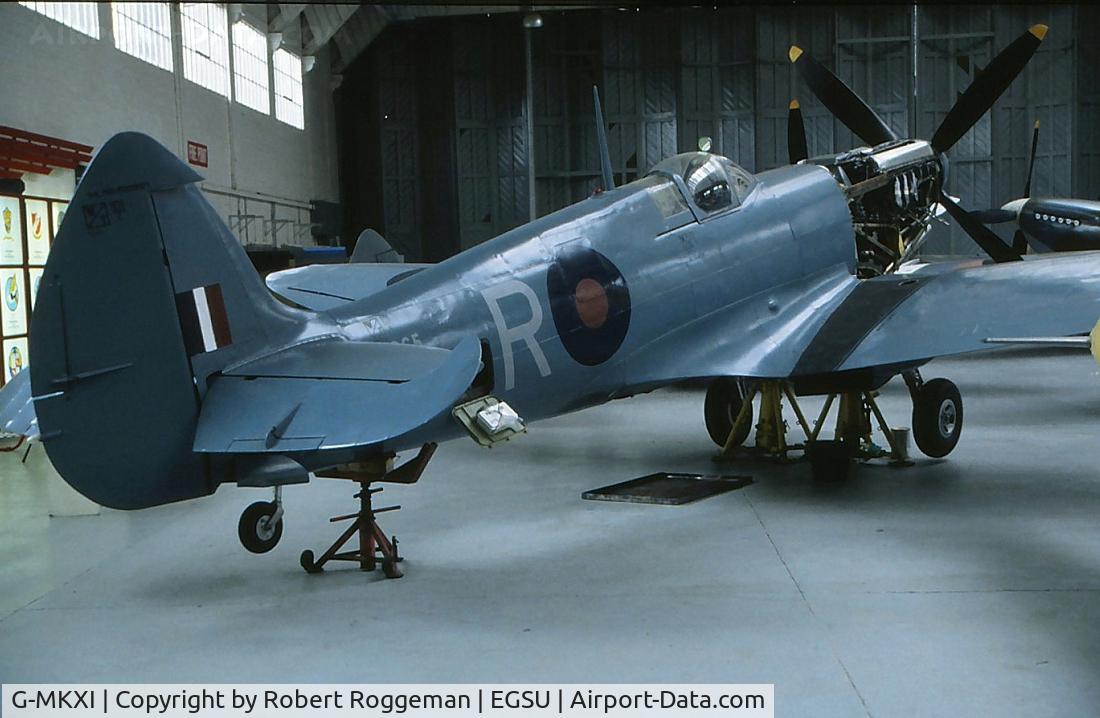 G-MKXI, 1944 Supermarine 365 Spitfire PR.XI C/N 6S/504719, G-MKXI R in PRU blue.OFMC 1995.