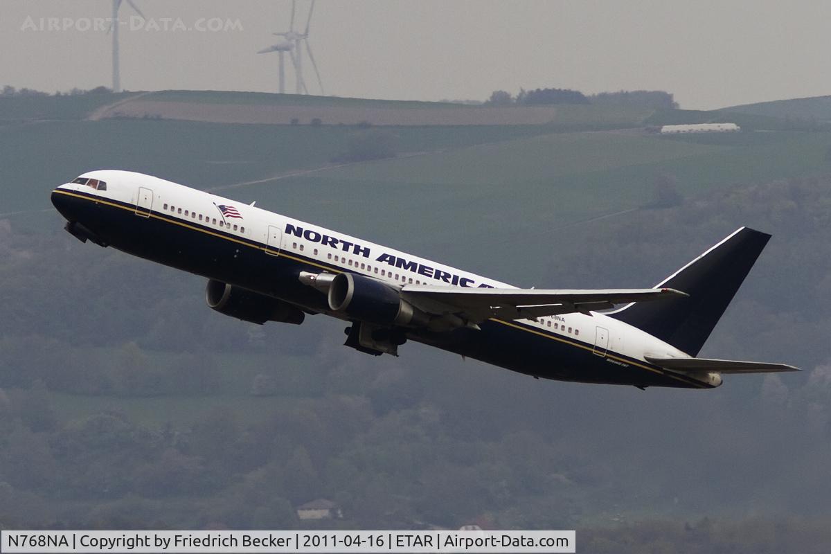 N768NA, 1999 Boeing 767-36NER C/N 29898, departing westbound