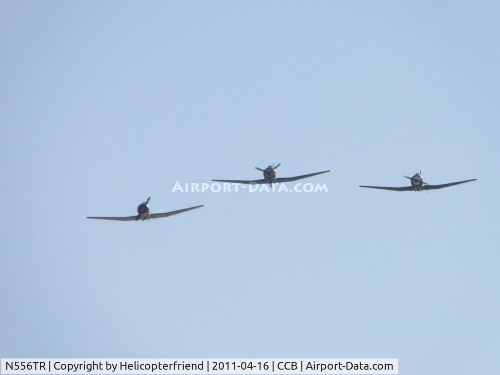N556TR, 1968 Nanchang CJ-6A C/N 2432060, N556TR Leading a three ship flyover. N4183E and N114DZ