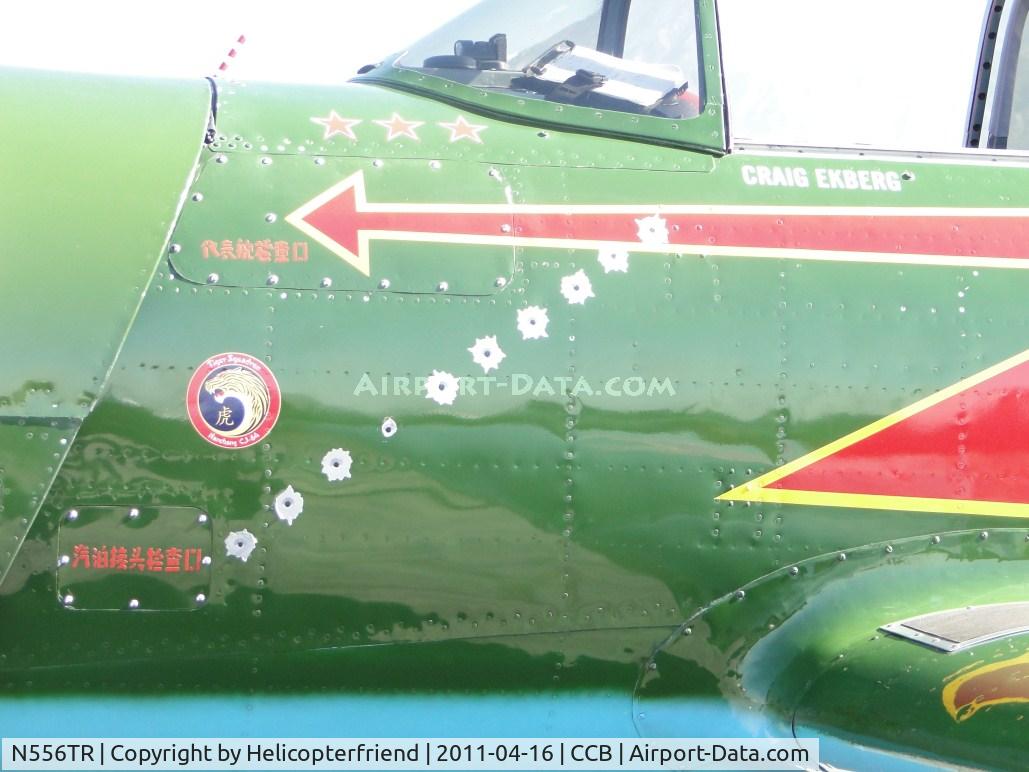 N556TR, 1968 Nanchang CJ-6A C/N 2432060, Decals looks like authentic bullet holes