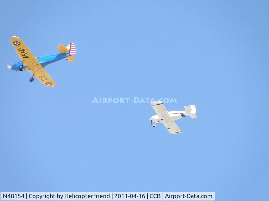 N48154, 1943 Fairchild M-62A C/N T437053, Leading N655RV in a 2 plane formation flight over runway 24