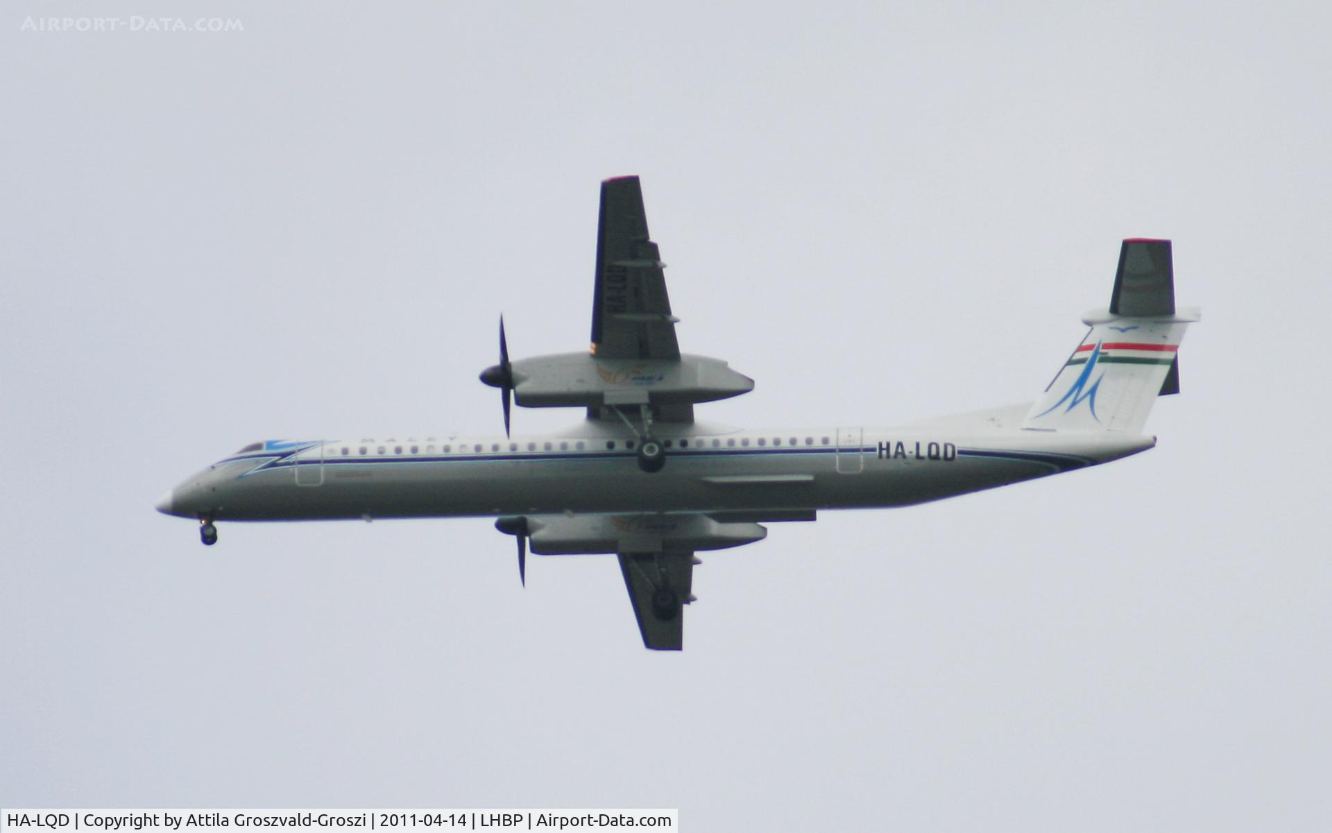 HA-LQD, 2002 De Havilland Canada DHC-8-402Q Dash 8 C/N 4063, Getting off direction Budapest Ferihegy onto an International Airport, in Üllö city airspace. They flew with painting like this with 65 years early Malév airplanes. And now a machine may carry this retro painting again.