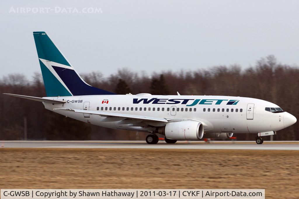 C-GWSB, 2005 Boeing 737-6CT C/N 34285, Taking off RWY26 at Waterloo going to Calgary
