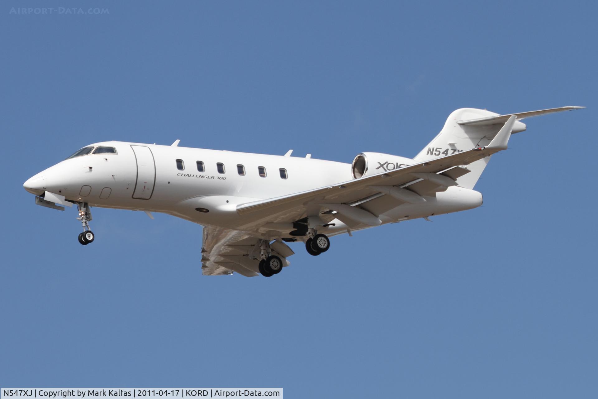 N547XJ, 2009 Bombardier Challenger 300 (BD-100-1A10) C/N 20281, OXJET Bombardier BD-100-1A10, N547XJ arriving from KMDW, on approach RWY 28 KORD.