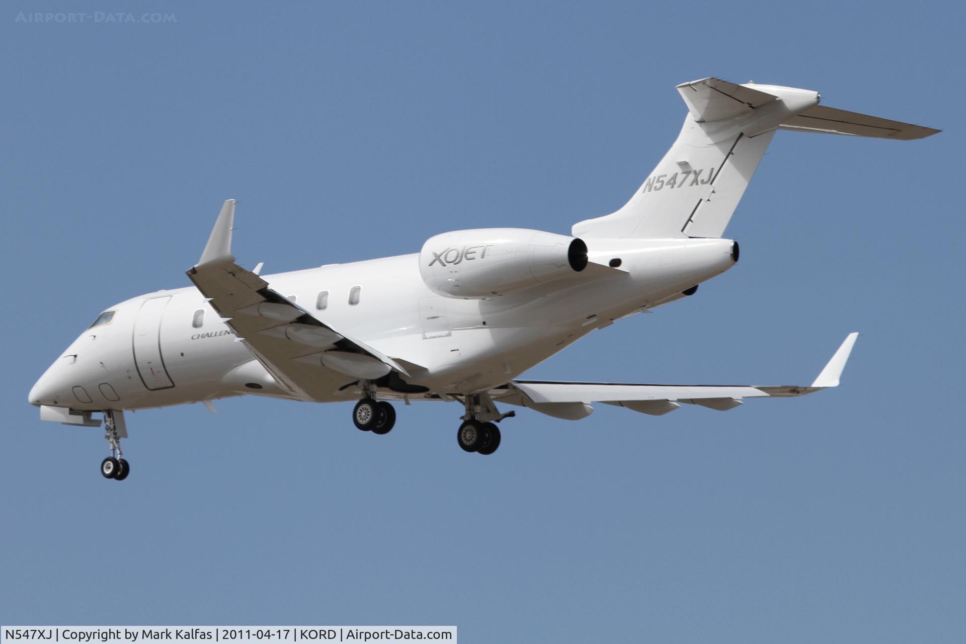 N547XJ, 2009 Bombardier Challenger 300 (BD-100-1A10) C/N 20281, OXJET Bombardier BD-100-1A10, N547XJ arriving from KMDW, on approach RWY 28 KORD.