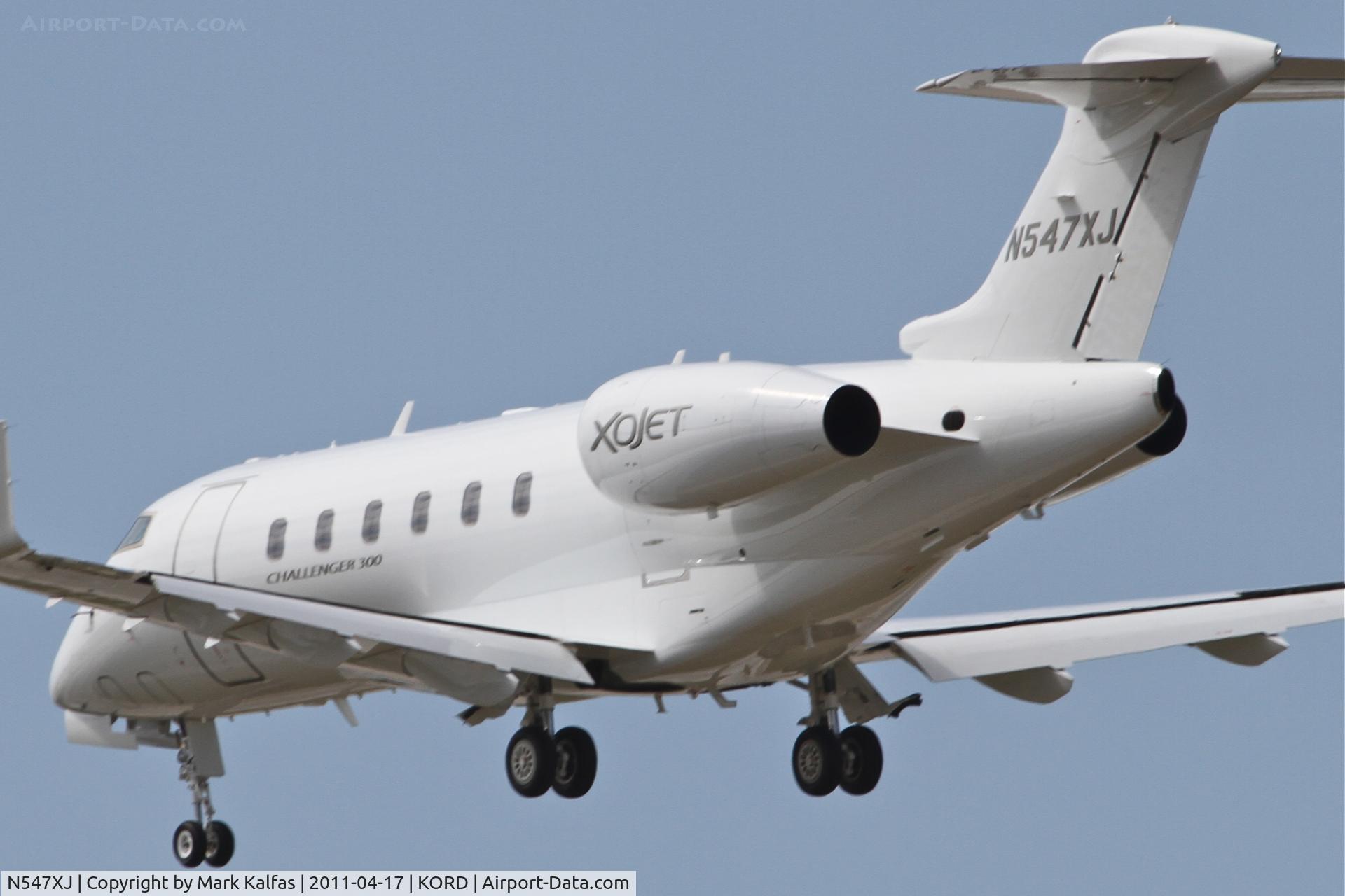 N547XJ, 2009 Bombardier Challenger 300 (BD-100-1A10) C/N 20281, OXJET Bombardier BD-100-1A10, N547XJ arriving from KMDW, on approach RWY 28 KORD.