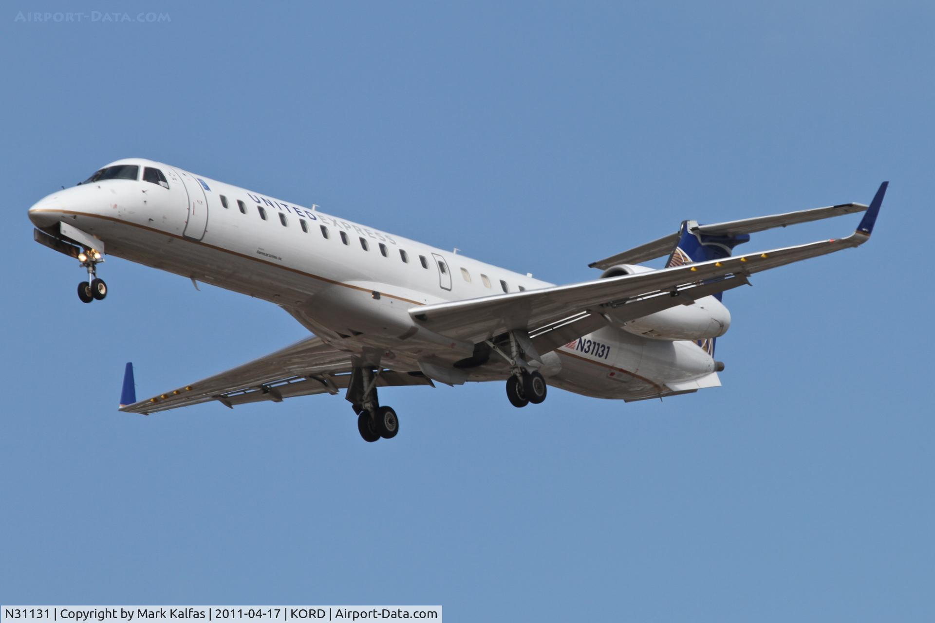 N31131, 2003 Embraer ERJ-145XR (EMB-145XR) C/N 145705, ExpressJet Airlines/United Express, BTA6106 arriving from KTUL, RWY 28 approach KORD.