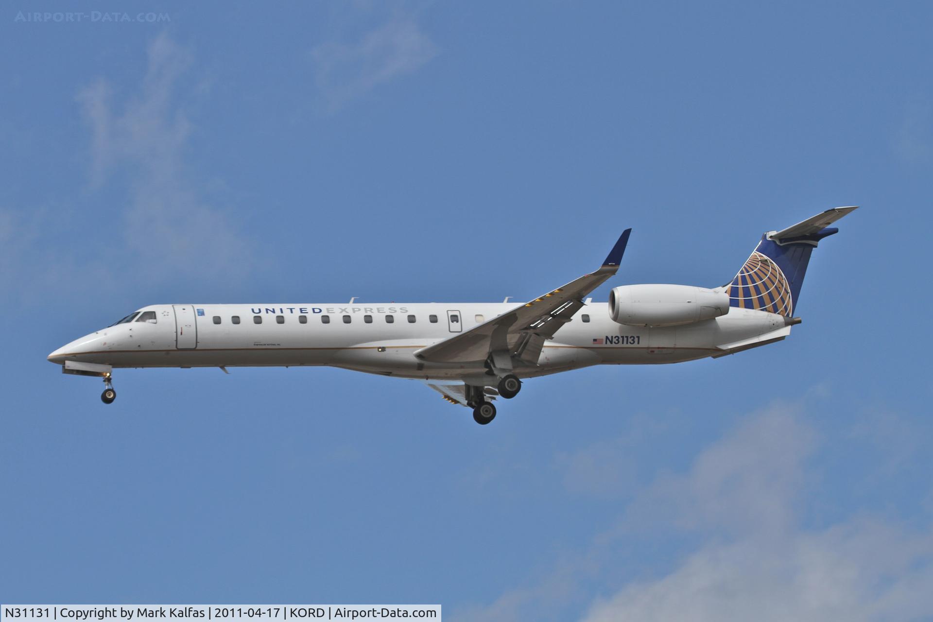 N31131, 2003 Embraer ERJ-145XR (EMB-145XR) C/N 145705, ExpressJet Airlines/United Express, BTA6106 arriving from KTUL, RWY 28 approach KORD.
