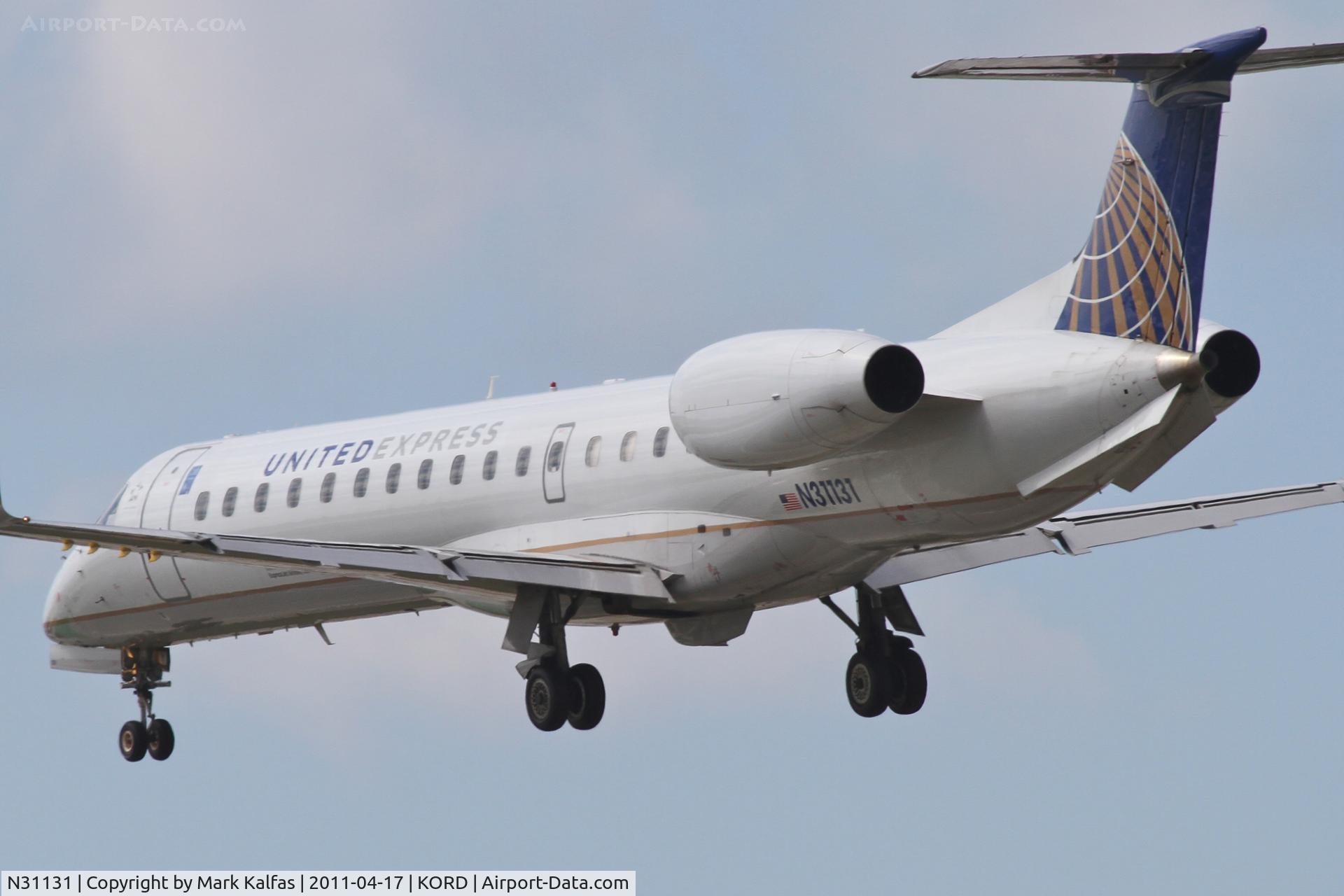 N31131, 2003 Embraer ERJ-145XR (EMB-145XR) C/N 145705, ExpressJet Airlines/United Express, BTA6106 arriving from KTUL, RWY 28 approach KORD.