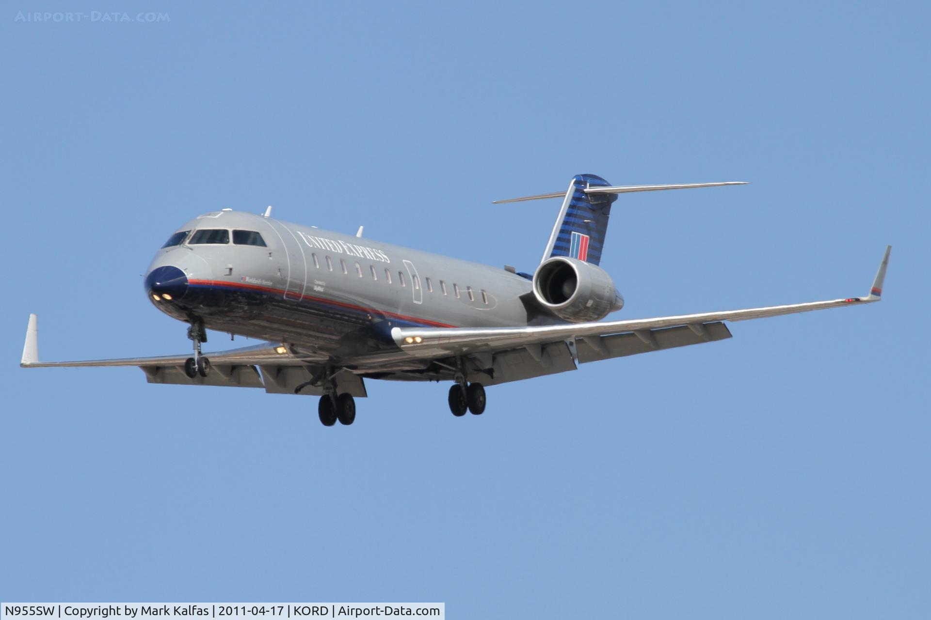 N955SW, 2003 Bombardier CRJ-200LR (CL-600-2B19) C/N 7817, SkyWest/United Express Bombardier CL-600-2B19, SKW7012 arriving from KIND, RWY 28 approach KORD.