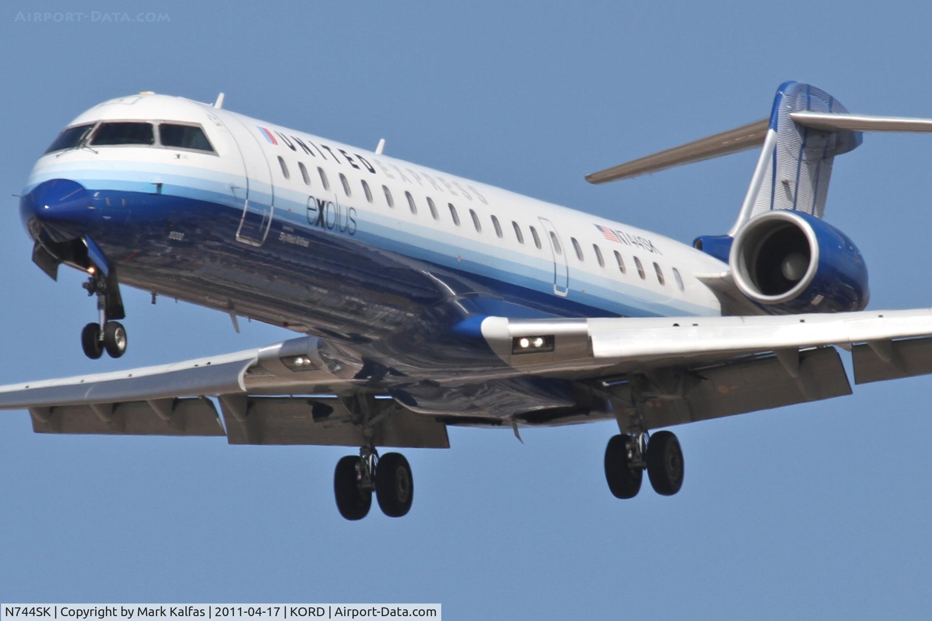 N744SK, 2005 Bombardier CRJ-701 (CL-600-2C10) Regional Jet C/N 10200, SkyWest/United Express Bombardier CL-600-2C10, SKW6669 arriving from KMSP, RWY 28 approach KORD.