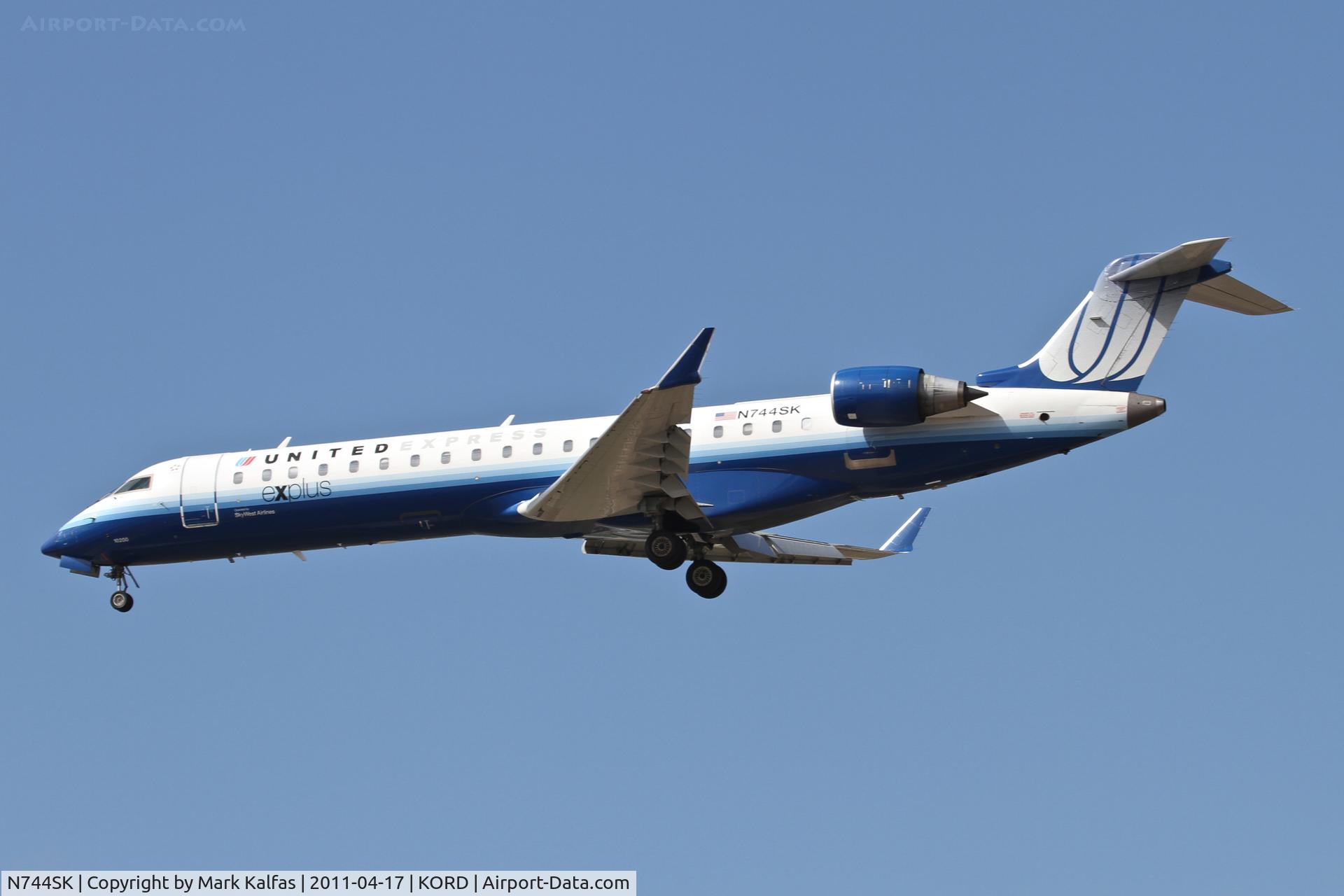 N744SK, 2005 Bombardier CRJ-701 (CL-600-2C10) Regional Jet C/N 10200, SkyWest/United Express Bombardier CL-600-2C10, SKW6669 arriving from KMSP, RWY 28 approach KORD.