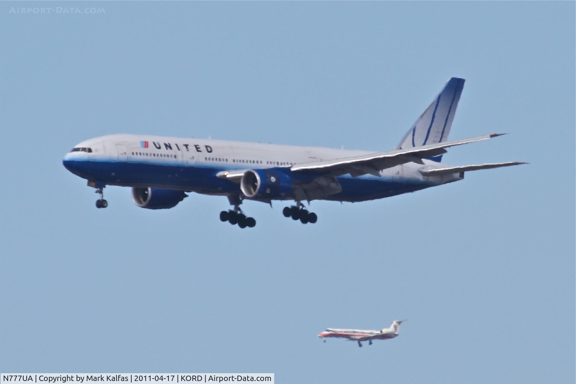 N777UA, 1995 Boeing 777-222 C/N 26916, United Airlines Boeing 777-222, UAL836 arriving from ZSPD (Shanghai Pudong Int'l ), on approach to RWY 27L KORD.