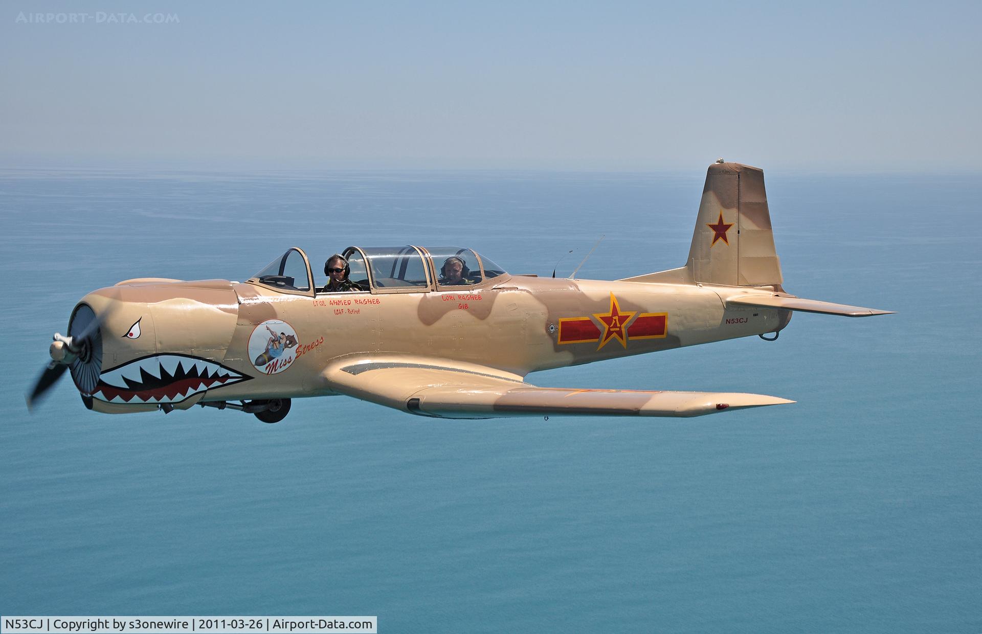 N53CJ, 1972 Nanchang CJ-6A C/N 2432062, In flight over Flagler Beach Florida