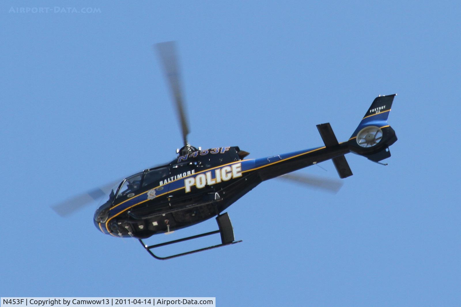 N453F, 2001 Eurocopter EC-120B C/N 1205, Flying nearby the Baltimore Aquarium. Quickly grabbed my camera and shot it!