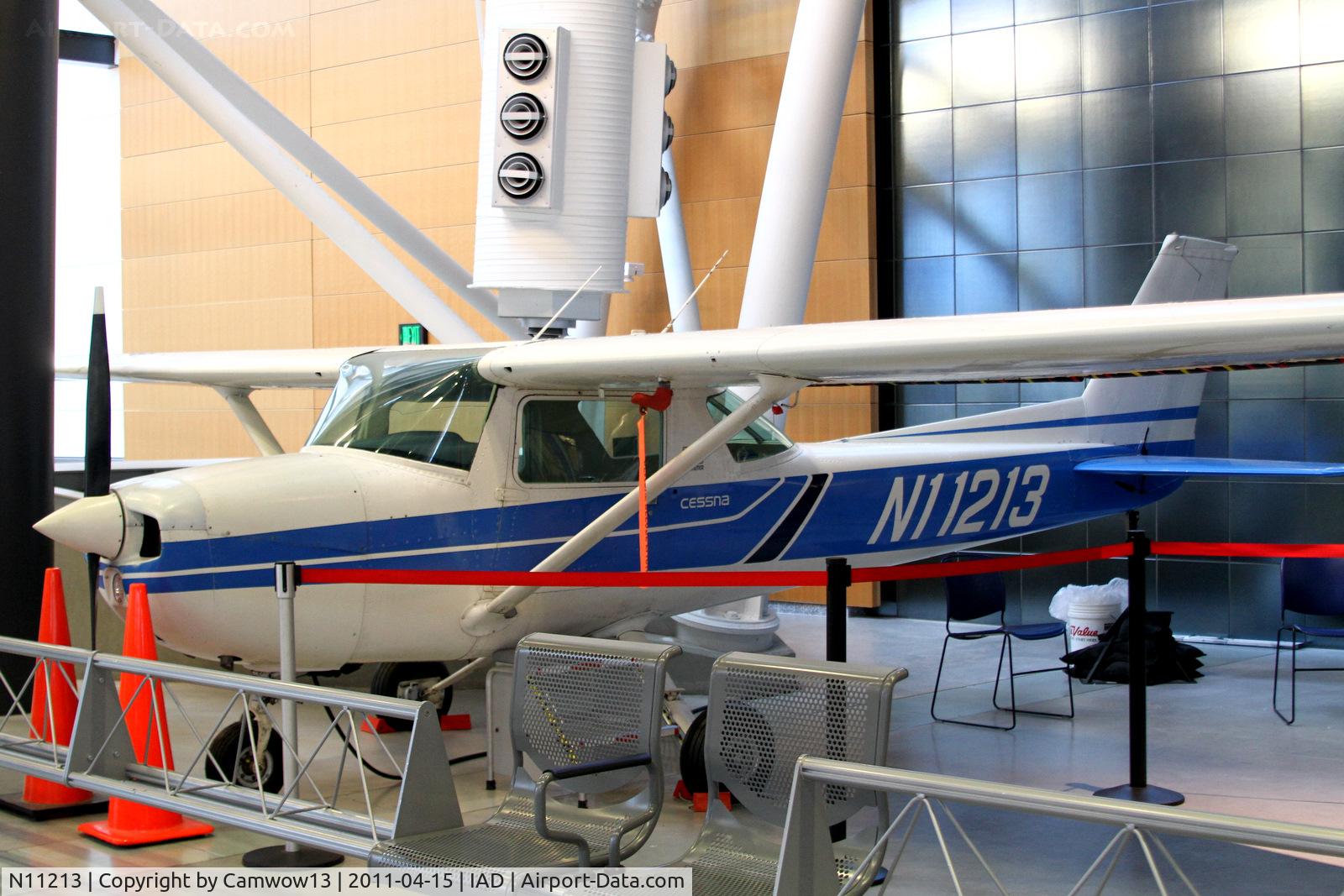 N11213, 1973 Cessna 150L C/N 15075257, Now used for showing people what the inside of a small aircraft is like. Saw lots of thrilled little kids get inside and pretend they were flying.