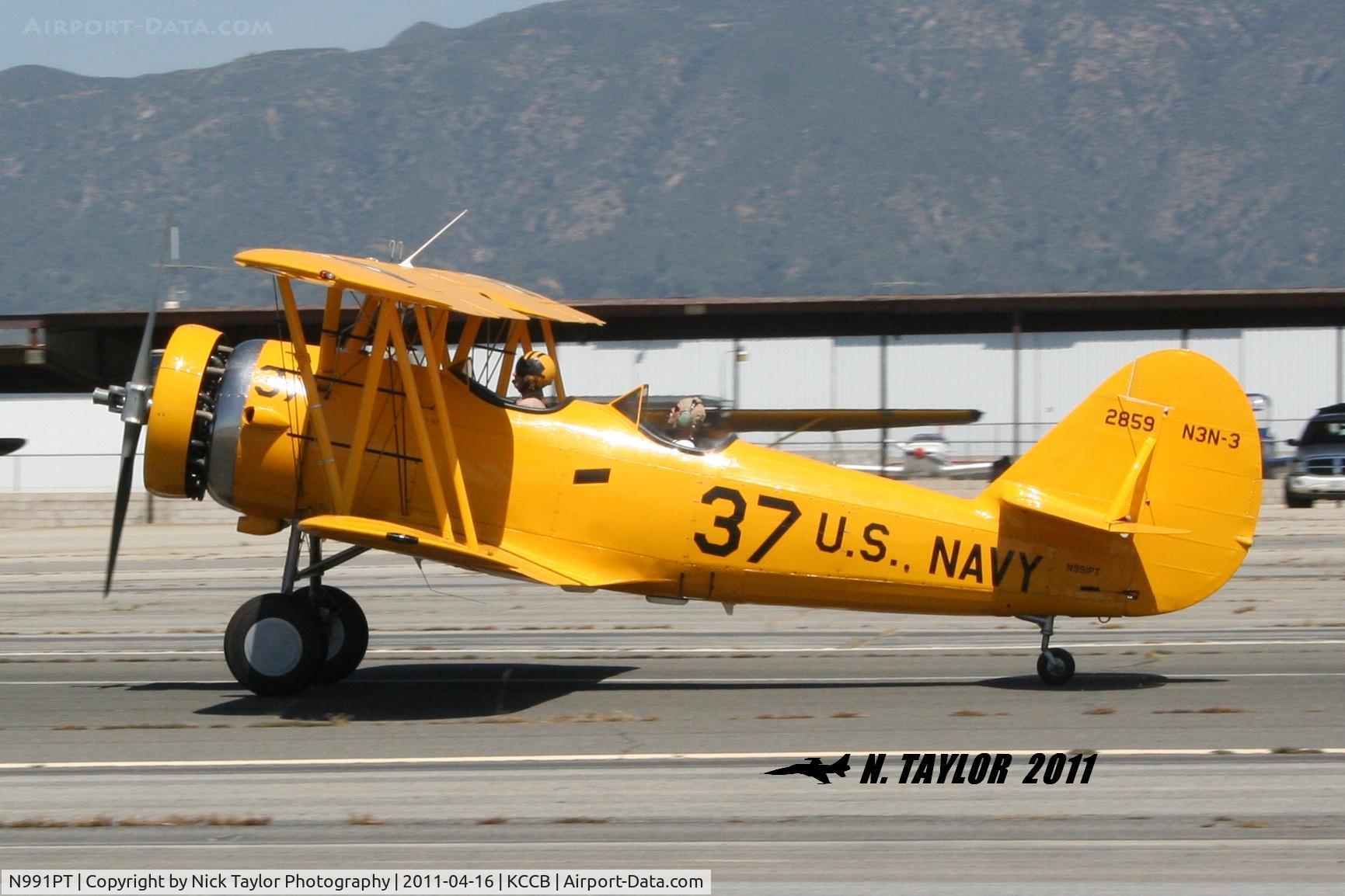 N991PT, 1938 Naval Aircraft Factory N3N-3 C/N 2859, Landing rollout rwy 24 Cable
