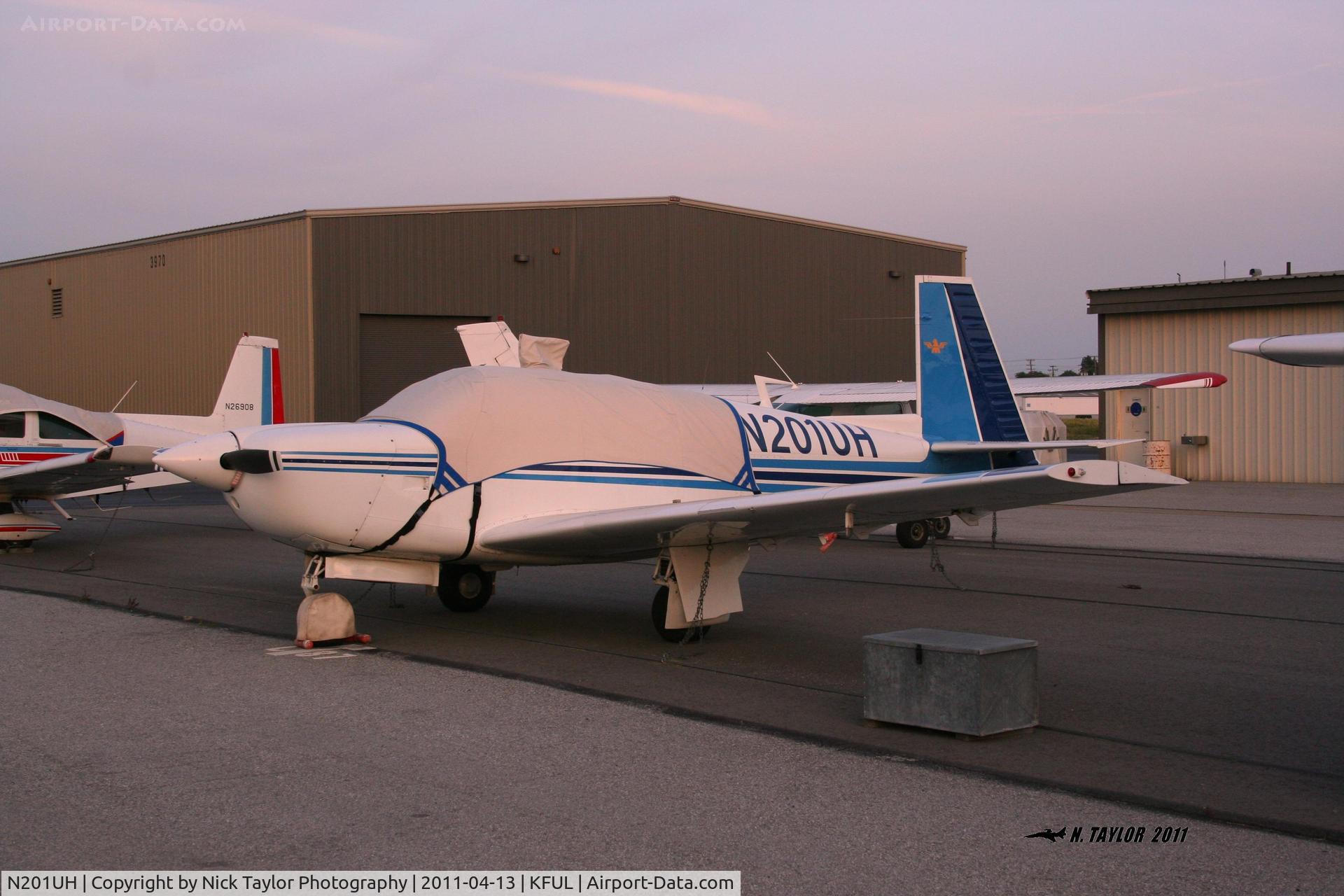N201UH, 1977 Mooney M20J 201 C/N 24-0370, Sitting on the North side tie downs