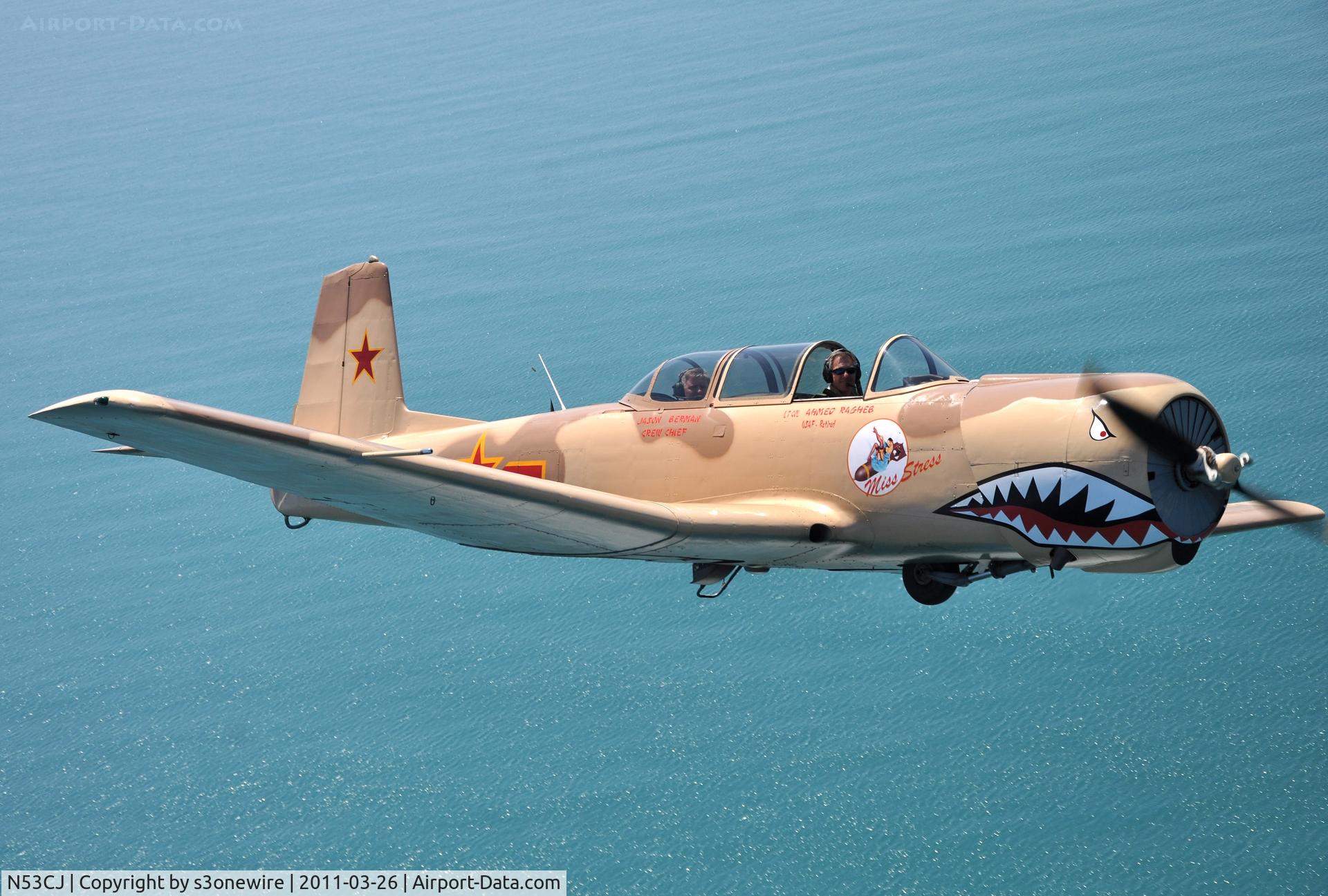 N53CJ, 1972 Nanchang CJ-6A C/N 2432062, In flight over Flagler Beach