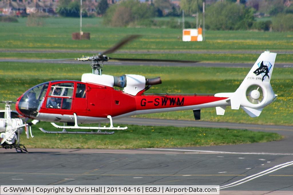 G-SWWM, 1973 Westland SA-341C Gazelle HT2 C/N WA1033, ex Royal Navy XW853, 'Sharks' display team. Now privately owned