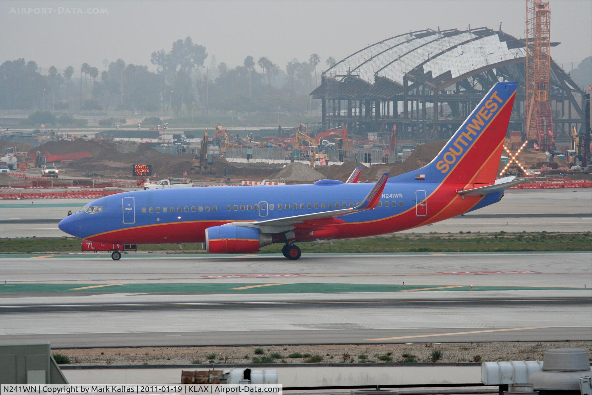 N241WN, 2006 Boeing 737-7H4 C/N 32504, Southwest Airlines Boeing 737-7H4, N241WN on TWY H after arriving at KLAX.