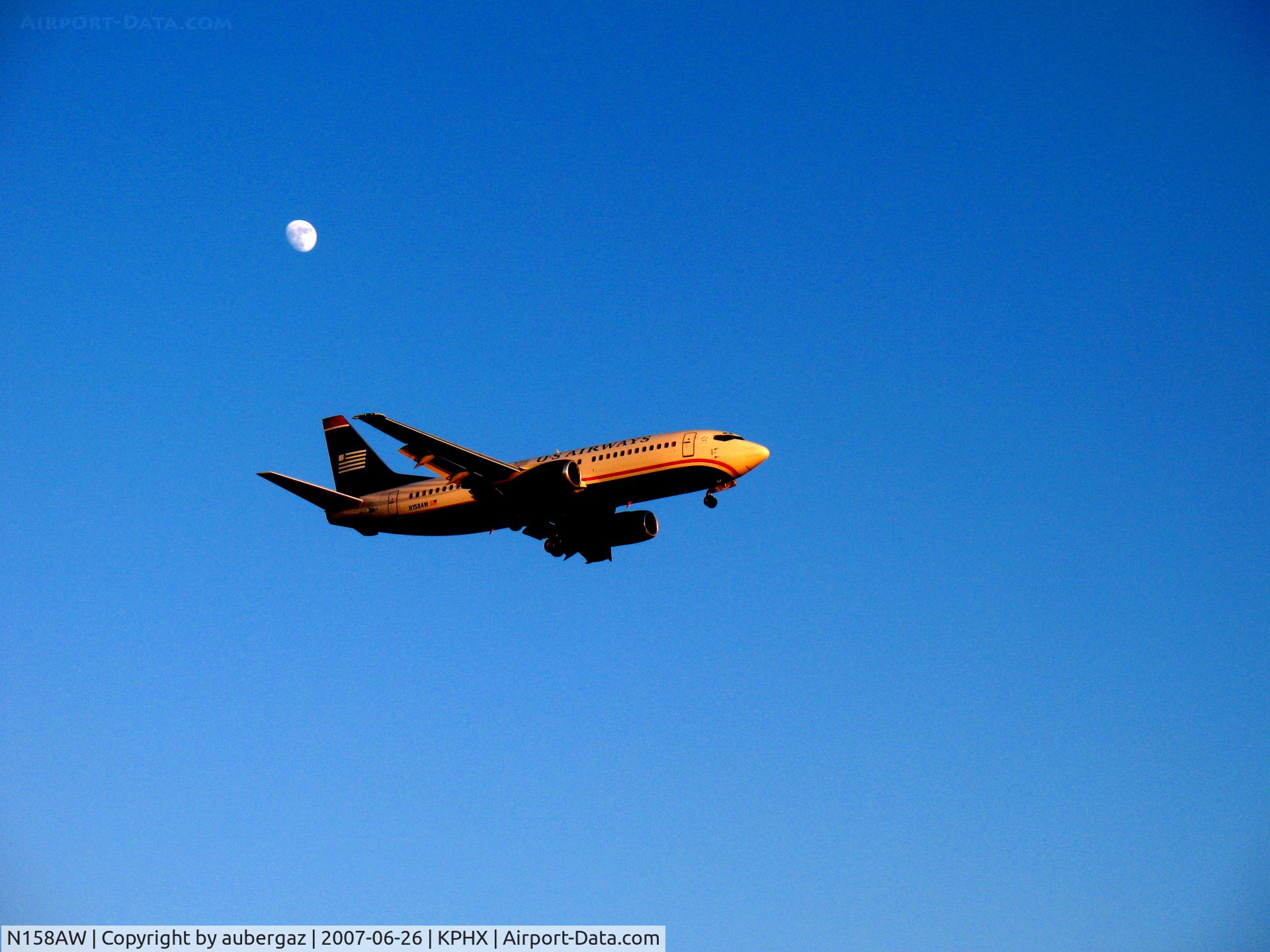 N158AW, 1987 Boeing 737-3G7 C/N 23780, PHX takeoff by a summer moon