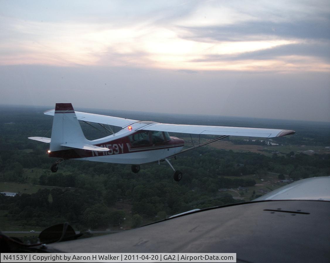 N4153Y, Bellanca 7GCAA C/N 336-77, N4153Y in formation with N3240V over GA2 Peachstate Airport.