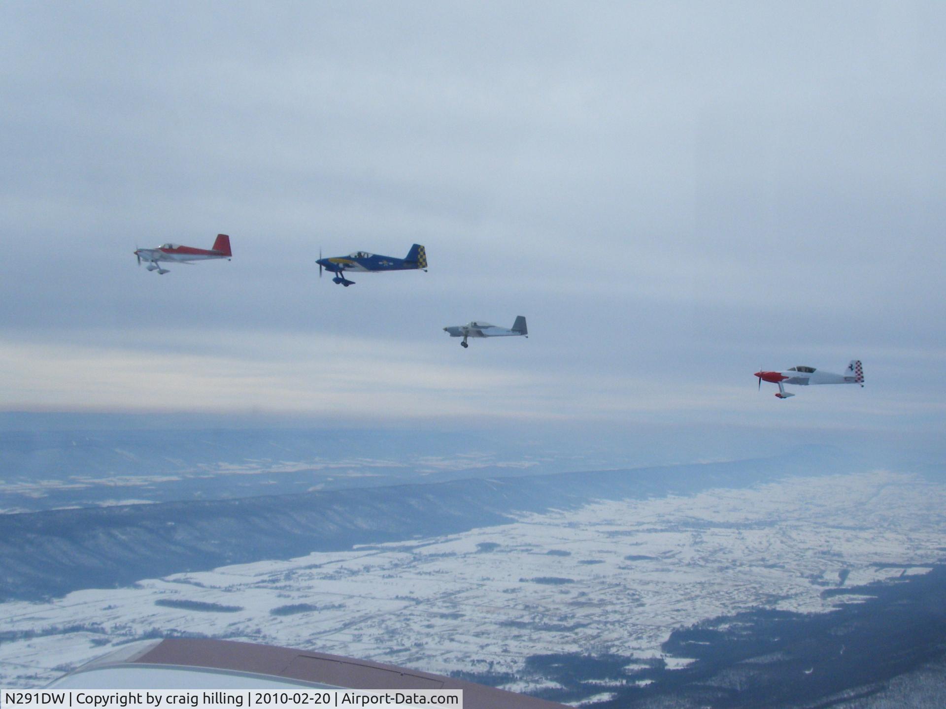 N291DW, 2000 Vans RV-6 C/N 001 (N291DW), Blue and yellow RV-6 in formation