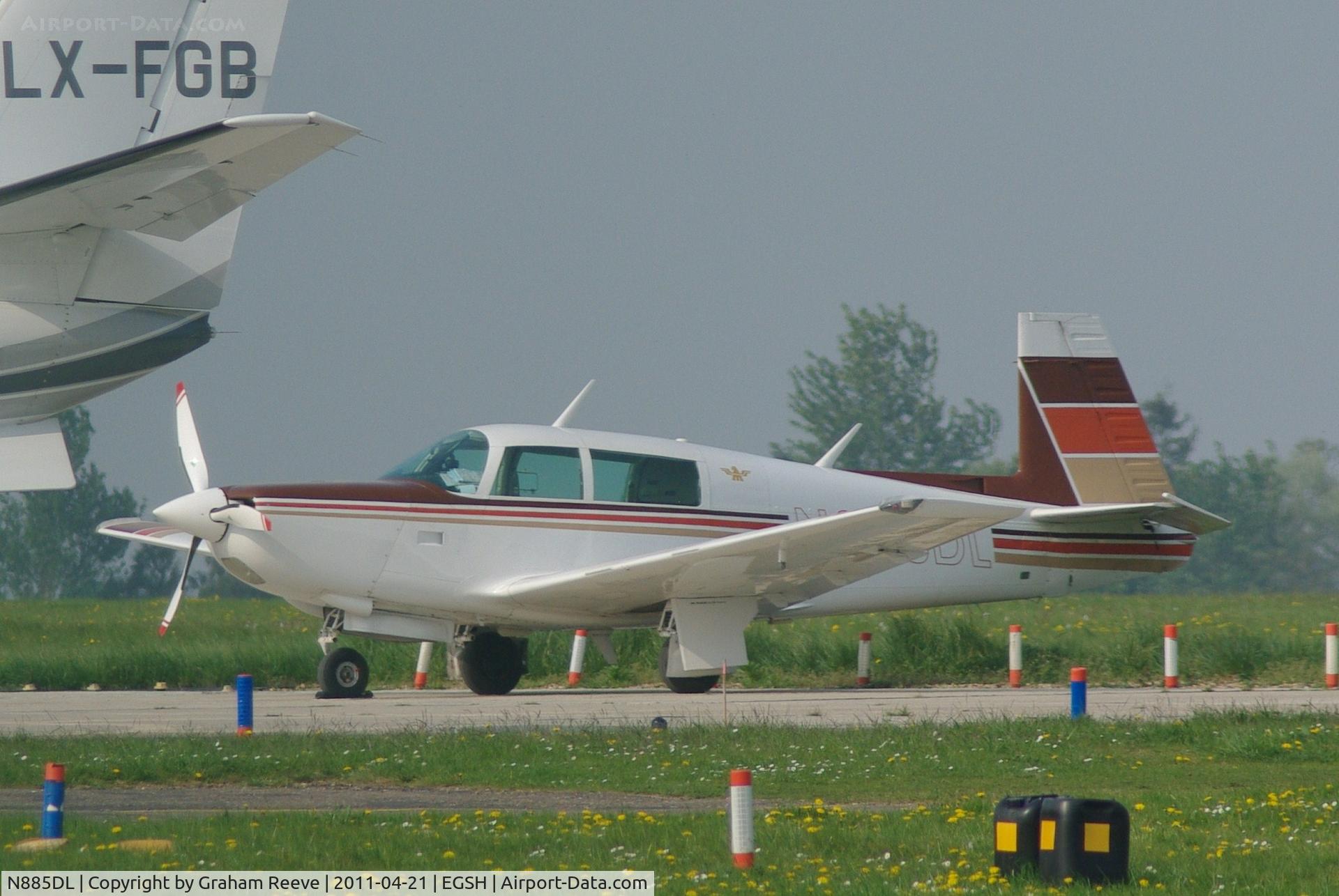 N885DL, 1980 Mooney M20K C/N 250479, Parked in the sun.
