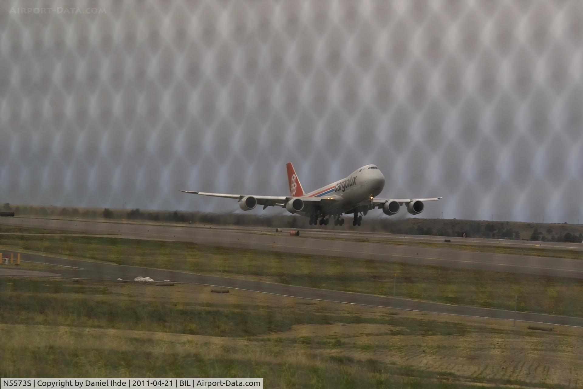N5573S, 2010 Boeing 747-8R7F C/N 35807, Cargolux 747 doing a few touch and go's @ BIL.  Experimenting with an old Pentax Super Takumar 135mm screwmount lens 