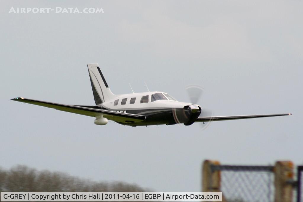 G-GREY, 1998 Piper PA-46-350P Malibu Mirage C/N 4636155, making a low flyby at Kemble