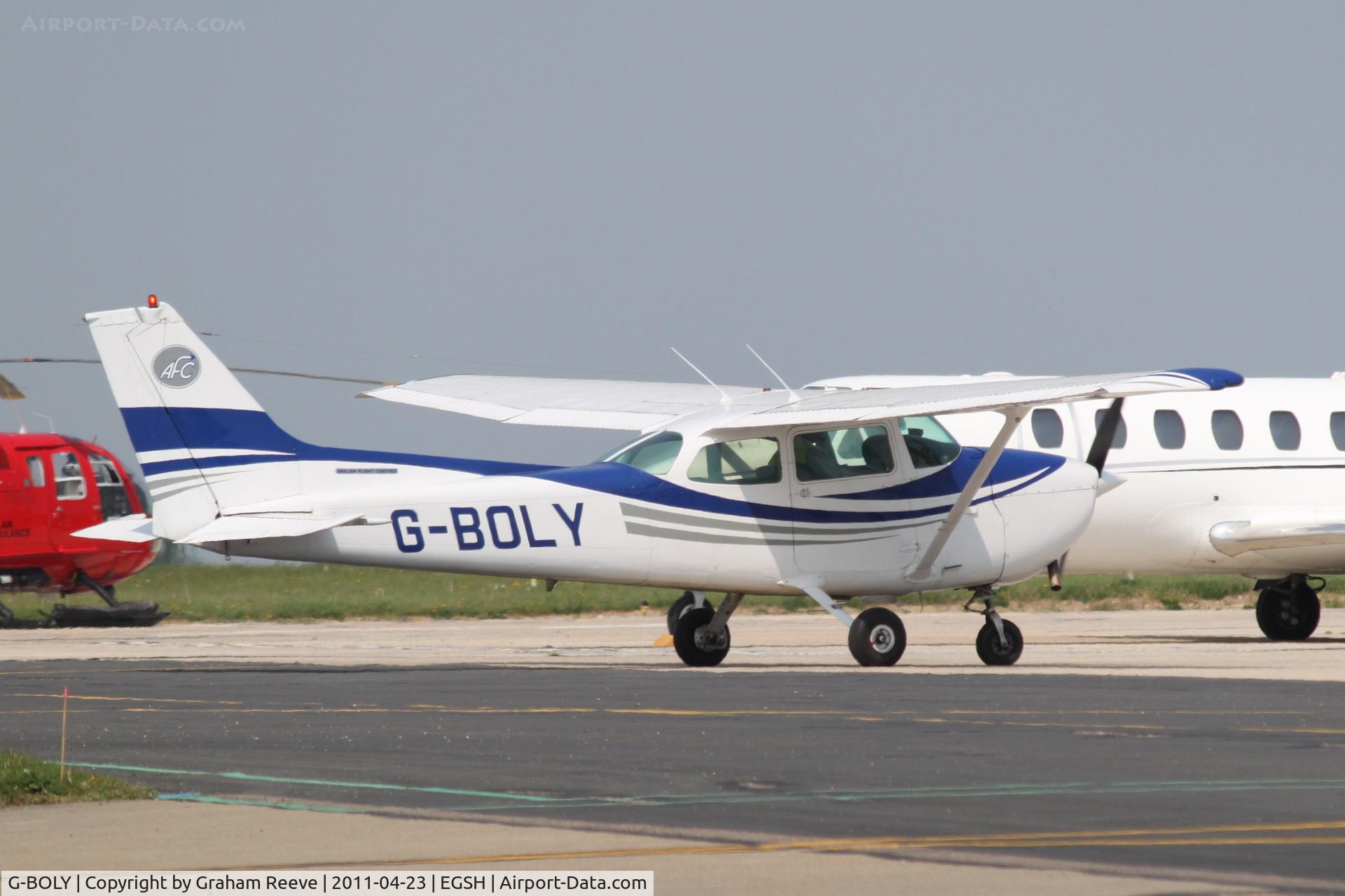 G-BOLY, 1977 Cessna 172N C/N 172-69004, About to come to a full stop.