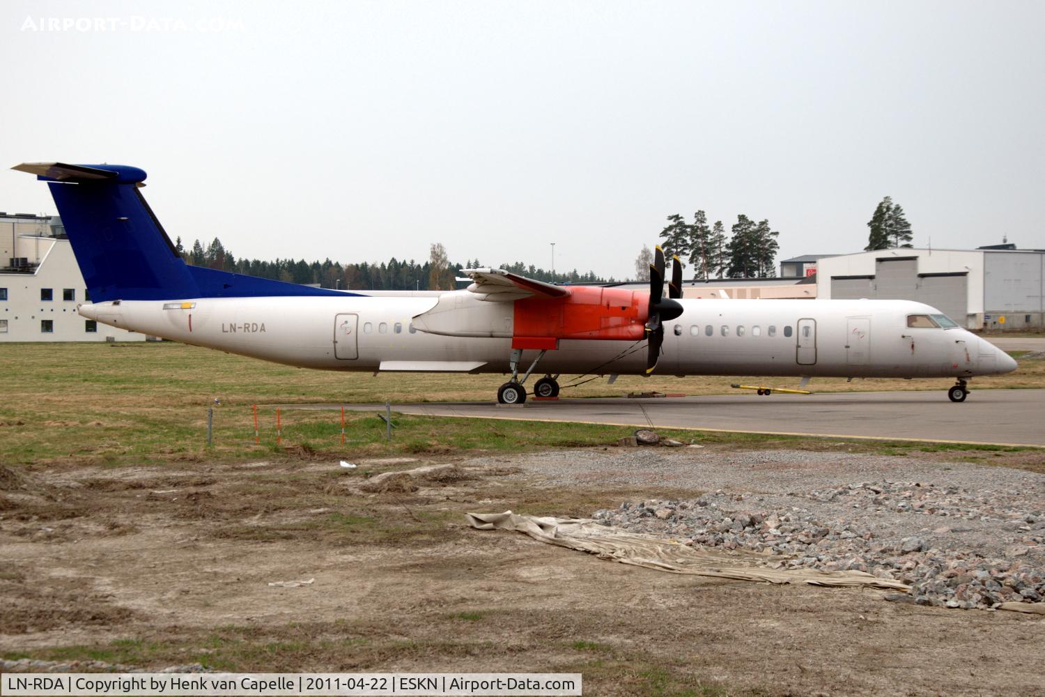 LN-RDA, 1999 De Havilland Canada DHC-8-402Q Dash 8 C/N 4013, SAS Commuter Dash 8-400 at Nyköping Skavsta airport in Sweden. It is in storage after being taken out of service by SAS after a series of main landing gear collapses and has been here for over a year.