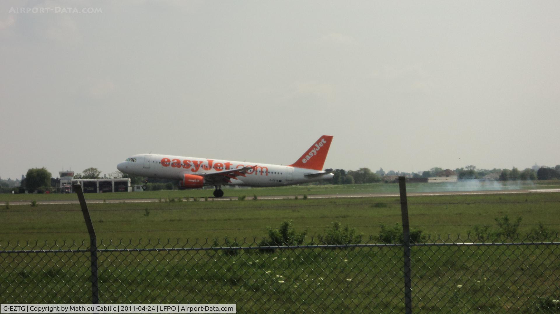 G-EZTG, 2009 Airbus A320-214 C/N 3946, Airbus A320-214 landing runway 06