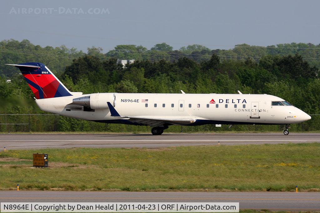 N8964E, 2004 Bombardier CRJ-200 (CL-600-2B19) C/N 7964, Delta Connection (Pinnacle Airlines) N8964E (FLT FLG4227) on takeoff roll RWY 23 en route to Boston Logan Int'l (KBOS).