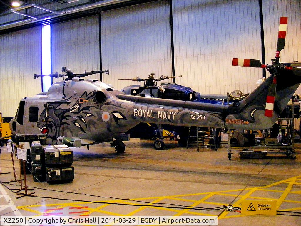 XZ250, 1978 Westland Lynx HAS.3S C/N 084, former Royal Navy 'Wildcat' display team Lynx inside Hangar 6. Rumoured to be going to the International Helicopter Museum, Weston-super-Mare