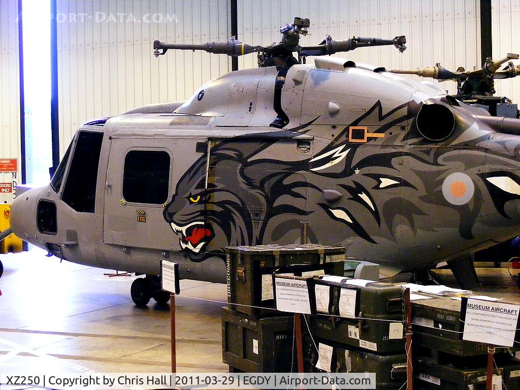 XZ250, 1978 Westland Lynx HAS.3S C/N 084, former Royal Navy 'Wildcat' display team Lynx inside Hangar 6. Rumoured to be going to the International Helicopter Museum, Weston-super-Mare