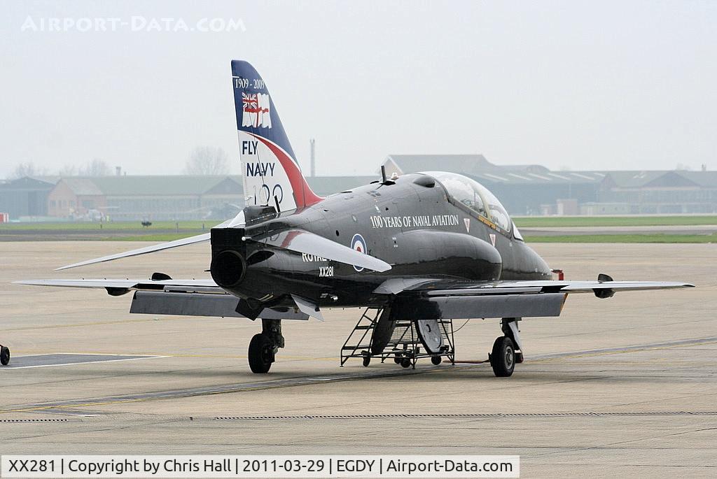 XX281, 1979 Hawker Siddeley Hawk T.1A C/N 106/312106, on the FRADU Hawk apron wearing RN titles and 'Fly Navy' tail art