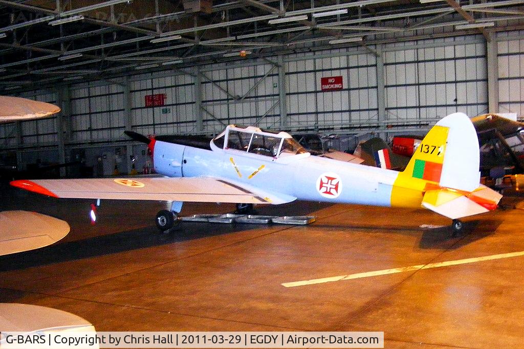 G-BARS, 1952 De Havilland DHC-1 Chipmunk T.10 C/N C1/0557, inside the 727 NAS Hangar. In Portugese Air Force colours and wearing the serial 1377