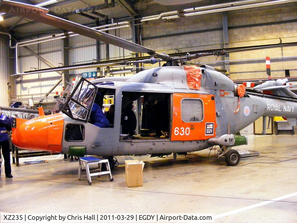 XZ235, 1977 Westland Lynx HAS.3S(ICE) C/N 016, inside Hangar 6 - Lynx heavy maintenance unit, 'HMS Endurance' on nose