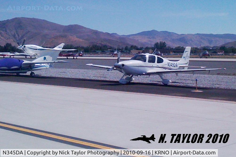 N345DA, 2005 Cirrus SR22 GTS C/N 1674, Parked at RNO in the overflow parking area for the air races.